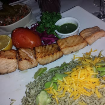 Persepolis - SALMON KEBAB marinated filet of salmon, served over rice - Middle Eastern Near Me - New York, New York Persepolis - SALMON KEBAB marinated filet of salmon, served over rice - Middle Eastern Near Me - New York, New York
