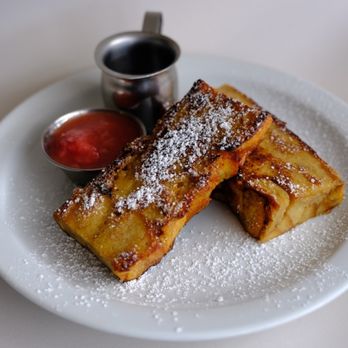 The Hazel Room - a plate of french toast with powdered sugar - Breakfast & Brunch Near Me - Portland, Oregon The Hazel Room - a plate of french toast with powdered sugar - Breakfast & Brunch Near Me - Portland, Oregon
