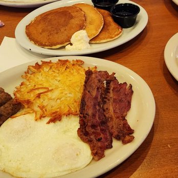 Coco's - The Triple Mega Breakfast with almost finished cinnamon roll (on the right) - American Near Me - Mission Hills, California
