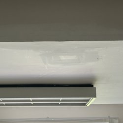 Kitchens & Baths by Cardigan - Toilet leaked into bsmt when installing, this is how they left my basement ceiling. I tried calling to have them finish, they never did.