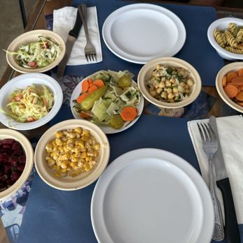 Etzel Itzik Deli - All the sides presented when you sit down - Delis Near Me - Miami, Florida