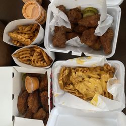 Hangry Joe’s Hot Chicken And Wings - Chicken wings with Tostitos waffle cheese fries