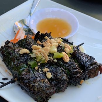 Monsoon Seattle - Bò Lá Lốt (marinated flank steak wrapped around la lot leaves and grilled) - Vietnamese Near Me - Seattle, Washington Monsoon Seattle - Bò Lá Lốt (marinated flank steak wrapped around la lot leaves and grilled) - Vietnamese Near Me - Seattle, Washington