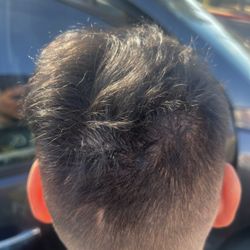 Famous Cutz Barbershop - A mess. They won't tell you an apprentice that is still in school is doing your hair, and will charge you full price.