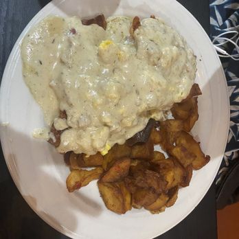 The Twins Restaurant - Country Benedict with subbed gravy instead of hollandaise with crisp home fried potatoes - American Near Me - Cotati, California The Twins Restaurant - Country Benedict with subbed gravy instead of hollandaise with crisp home fried potatoes - American Near Me - Cotati, California