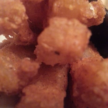 Outback Steakhouse - Closeup on them blooming onion wedges. - Steakhouses Near Me - Ontario, California Outback Steakhouse - Closeup on them blooming onion wedges. - Steakhouses Near Me - Ontario, California