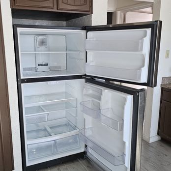 Caro House Cleaning - Fridge looks like it was brand new - Home Cleaning Near Me