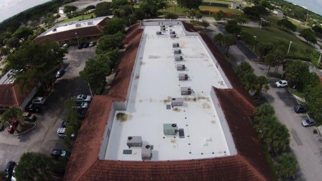 Slide of Rainbow Roofing Solutions