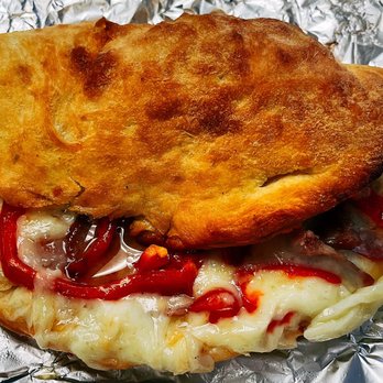 Italian Pavilion - sausage and pepper calzone - Italian Near Me - White Plains, New York Italian Pavilion - sausage and pepper calzone - Italian Near Me - White Plains, New York