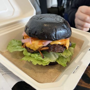 Black Heart Coffee - New on the menu! Their version of a smash burger! It was really yummy! Charcoal bun with picked onions and kimchee aioli. Will order again! - Coffee & Tea Near Me - Los Angeles, California Black Heart Coffee - New on the menu! Their version of a smash burger! It was really yummy! Charcoal bun with picked onions and kimchee aioli. Will order again! - Coffee & Tea Near Me - Los Angeles, California