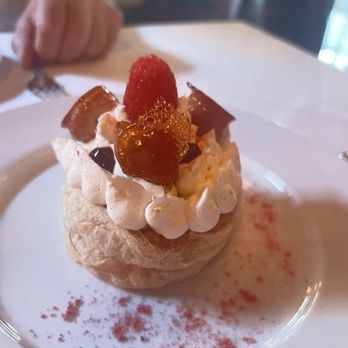 St Martin's Wine Bistro - Profiteroles with whipped cream and raspberry - French Near Me - Dallas, Texas
