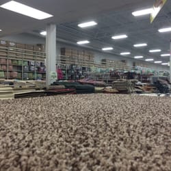 Old Time Pottery - Rugs. Lots of them