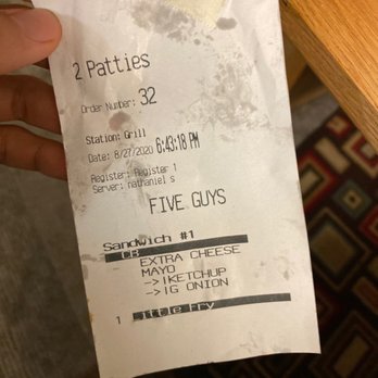 Five Guys - a person holding a receipt in their hand - Burgers Near Me - Tacoma, Washington