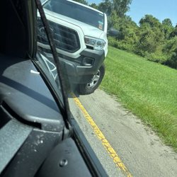 Folly Beach Police Department - Gave him the License Plate and the name on the side of the truck they were following us and the police did nothing
