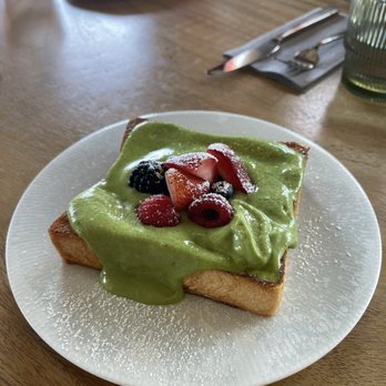 Between Us - Simple Toast + Make it Extraordinary (topped with matcha cream and mixed berries) - Breakfast & Brunch Near Me - San Diego, California Between Us - Simple Toast + Make it Extraordinary (topped with matcha cream and mixed berries) - Breakfast & Brunch Near Me - San Diego, California