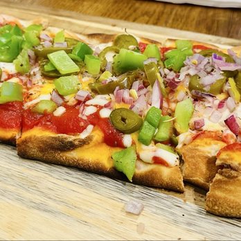Urban Pine Eatery - Beautiful and delicious 12" flatbread log style pizza..  This was my "BUILD YOUR OWN" - Priced at $14 as of 2/28/26 - Pizza Near Me - Flagstaff, Arizona