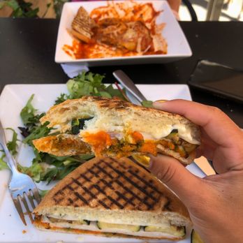 Ferrarini Cafe - liguria sandwich on rockenwagner bread (delicious chicken pesto with sun dried tomato spread) - Italian Near Me - Beverly Hills, California Ferrarini Cafe - liguria sandwich on rockenwagner bread (delicious chicken pesto with sun dried tomato spread) - Italian Near Me - Beverly Hills, California