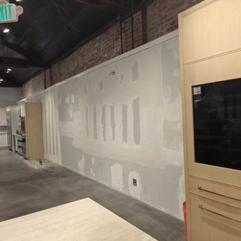 A1 USA Construction - Ferguson show room framing installing drywall and finish level 3 - General Contractors Near Me - Lancaster, California