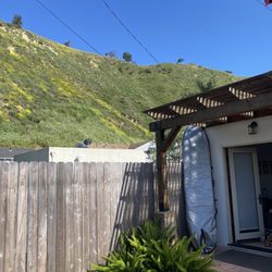 Sunny Days Vacation Rentals - This backyard!! Surfboard was ours.