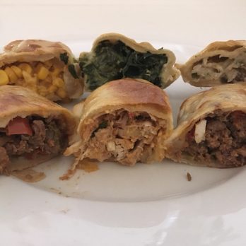Maria Empanada - L-R top: corn, spinach, mushroom. Bottom: beef, chicken, Argentina - Latin American Near Me - Denver, Colorado
