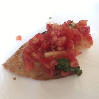 La Tavernetta 48 - Bruschetta al Pomodoro (or at what's left of the 4 slices...) - Italian Near Me - Rome, RM La Tavernetta 48 - Bruschetta al Pomodoro (or at what's left of the 4 slices...) - Italian Near Me - Rome, RM