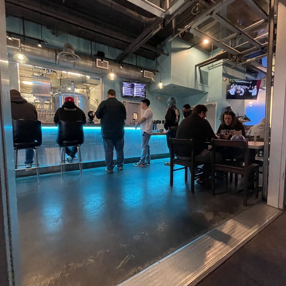 ISM Brewing & Kitchen - Inside scope from outside table - Brewpubs Near Me - Long Beach, California ISM Brewing & Kitchen - Inside scope from outside table - Brewpubs Near Me - Long Beach, California