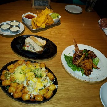 Hide - Tator tots, philly cheesesteak meatballs, sticky wings chips and guacamole... - Cocktail Bars Near Me - Dallas, Texas