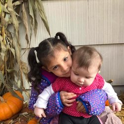 Learning Land Early Learning Program -Kent Campus - Zay and her cousin Layla at the annual Learning Land Pumpkin Patch