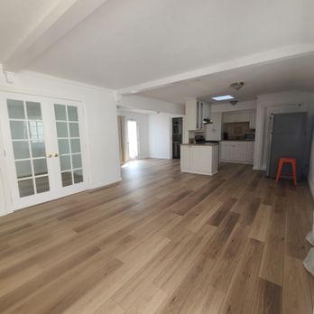 Premier Home Services - Complete flooring in the living room and kitchen. - Handyman Near Me - Fullerton, California Premier Home Services - Complete flooring in the living room and kitchen. - Handyman Near Me - Fullerton, California