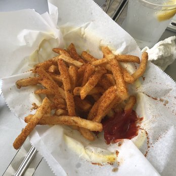 The Brass Monkey - Old bay fries - New American Near Me - St. Pete Beach, Florida The Brass Monkey - Old bay fries - New American Near Me - St. Pete Beach, Florida
