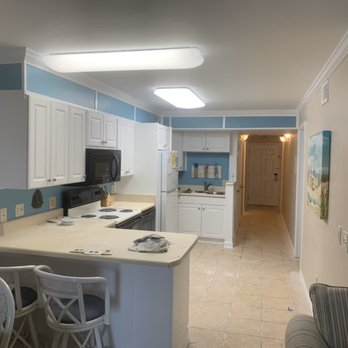 New Image Painters - Kitchen after popcorn ceiling removal, patching ceiling, and repainting all ceilings, walls, and trim - Painters Near Me