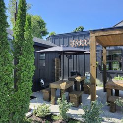 Plant No.01 - Small covered eating area on a beautiful day.