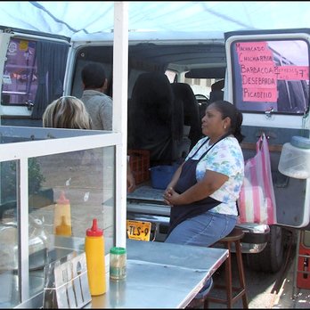 Chapa - Note the hand-printed sign taped to the rear window of the van that advertises the filling selections for the tacos. - Tacos Near Me - Ciudad Miguel Alemán, TAM