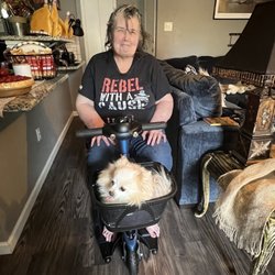 Lisa and Phoebe on their new scooter!