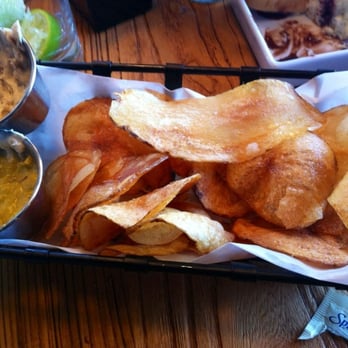 Drink Well - Homemade chips with the jalapeño dip and the smoked onion dip - yummy - Gastropubs Near Me - Austin, Texas