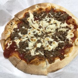a pizza with cheese and meat