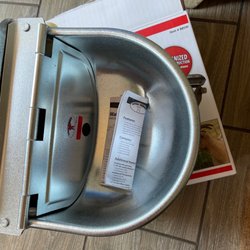 Tractor Supply - box that was re-taped closed, water bowl, and the instructions stapled closed with NONE of the parts that are listed as enclosed!