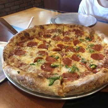 Monument Pies & Grinders - Half pepperoni/sausage the other half pepperoni/jalapeños. - Pizza Near Me - Monument, Colorado Monument Pies & Grinders - Half pepperoni/sausage the other half pepperoni/jalapeños. - Pizza Near Me - Monument, Colorado