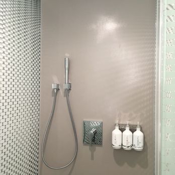 YOTEL Boston - Shower that has hand held spray and rain shower head, - Hotels Near Me - Boston, Massachusetts YOTEL Boston - Shower that has hand held spray and rain shower head, - Hotels Near Me - Boston, Massachusetts