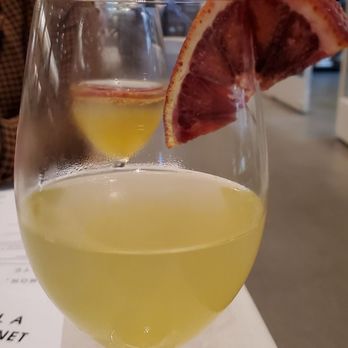 Sixty Vines - Mimosa bar. Pineapple mango with a blood orange - New American Near Me - Dallas, Texas Sixty Vines - Mimosa bar. Pineapple mango with a blood orange - New American Near Me - Dallas, Texas