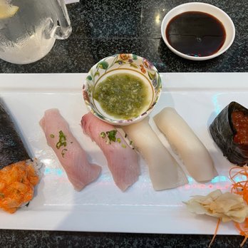 Thai Star Sushi Bar - Scallop hand roll with the Masago eggs Yellowtail , escolar and ikura - Thai Near Me - Madeira Beach, Florida Thai Star Sushi Bar - Scallop hand roll with the Masago eggs Yellowtail , escolar and ikura - Thai Near Me - Madeira Beach, Florida