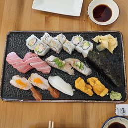Uni, sweet shrimp, toro, animal, Cal roll, ika, scallop handroll. Uni, sweet shrimp, toro, animal, Cal roll, ika, scallop handroll.