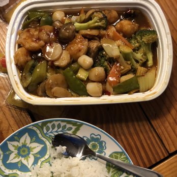 Zou's Kitchen - a plate of rice and a bowl of vegetables - Chinese Near Me - Helena, Alabama