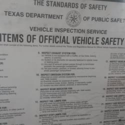 Z & V Auto Care - pointing to the headlight item while failing my inspection with a cracked foglight cover. For lights not required