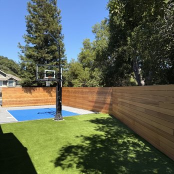 Lucio Landscape Construction - Custom sport court, premium artificial turf and modern cedar fencing. Built to enjoy for years to come. - Landscaping Near Me Lucio Landscape Construction - Custom sport court, premium artificial turf and modern cedar fencing. Built to enjoy for years to come. - Landscaping Near Me
