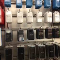 Apple Store - Pointe-Claire - IPhone 5C cases on display to buy