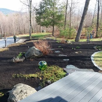 TM&M Services - a view from the deck of a garden - Landscaping Near Me TM&M Services - a view from the deck of a garden - Landscaping Near Me