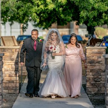 Pacific View Tower by Wedgewood Weddings - Walking down the isle in the garden area - Venues & Event Spaces Near Me - Oxnard, California Pacific View Tower by Wedgewood Weddings - Walking down the isle in the garden area - Venues & Event Spaces Near Me - Oxnard, California