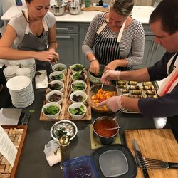 Home Somm - Home Somm kitchen team in action finishing up plating dishes for a private tasting in Burbank