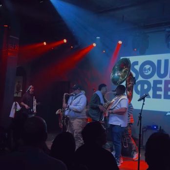 The Hamilton - a band performing on stage - Seafood Near Me - Washington, DC, District of Columbia